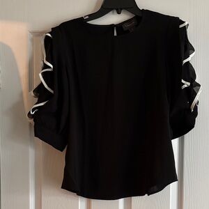 Gracia Black Blouse with White Ruffle Trim